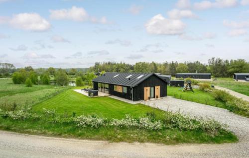 Fjellerup Strand House | Inviting Home in Glesborg with Pool and Kitchen Access