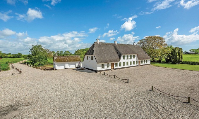 Kelstrup House | Idyllic Oceanfront Retreat in Former Thatched Farmhouse