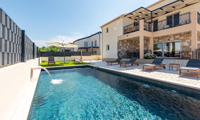 Vrsi House | Relax by the Beach in a Modern Vacation Home with Pool