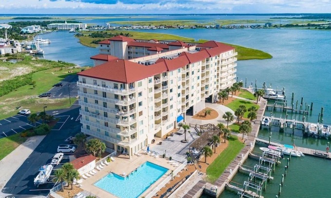Morehead City Condo | Inlet View Oasis with Balcony, Pool, and Top Ratings