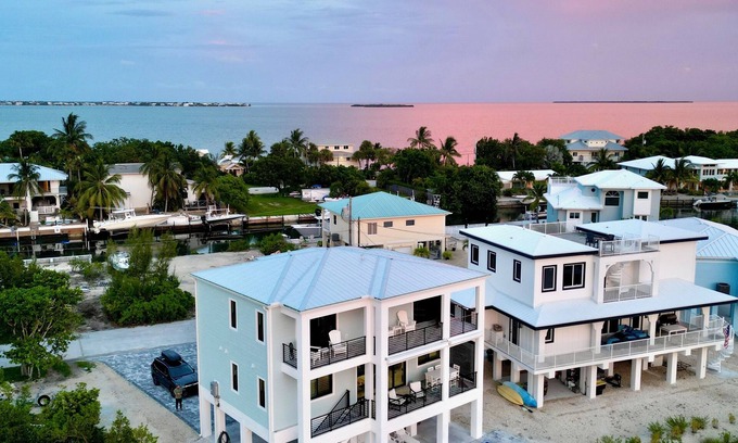 Cudjoe Gardens House | Gorgeous new build on Cudjoe Marina Basin with 80 ft boat dock and private pool