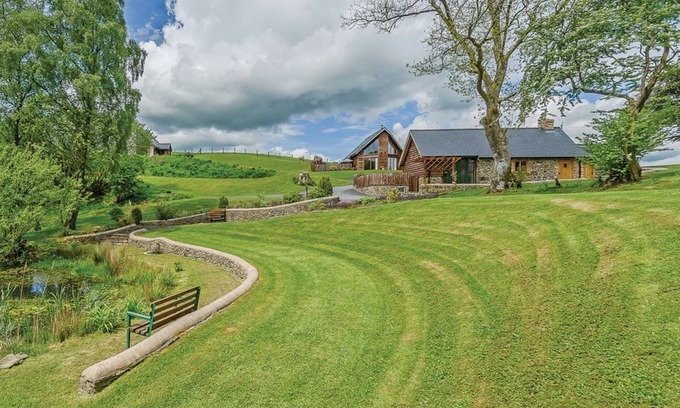 Caersws Ski Chalet | Inviting Two-Storey Lodge with Spa and Hot Tub Amenities