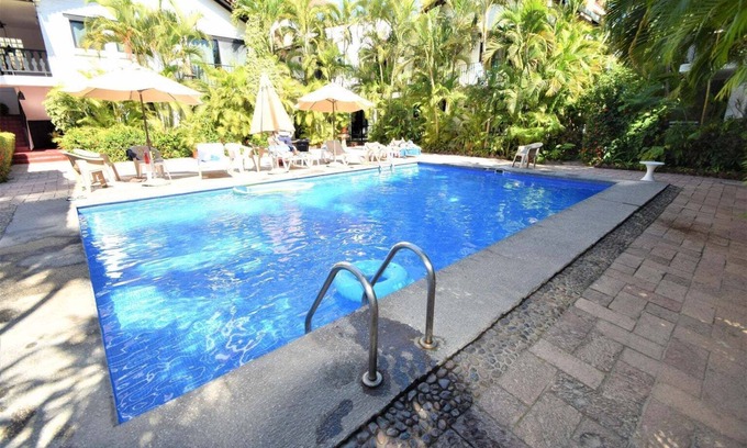 North Hotel Zone Condo | Top-Rated Flamingos Suites: Steps from the Beach & Pool