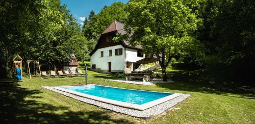 Soca Villa | Gorska Vila: Oceanfront Mountain Retreat with Pool Access