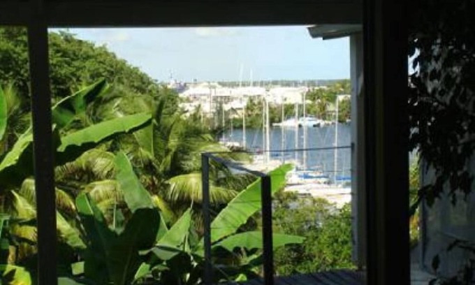 Bas du Fort Apartment | Gosier Apartment: Oceanfront Stay with Spa and Hot Tub