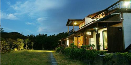 Jocheon House | Experience Gotjawal Geomunoreum Pension with Family-Friendly Amenities