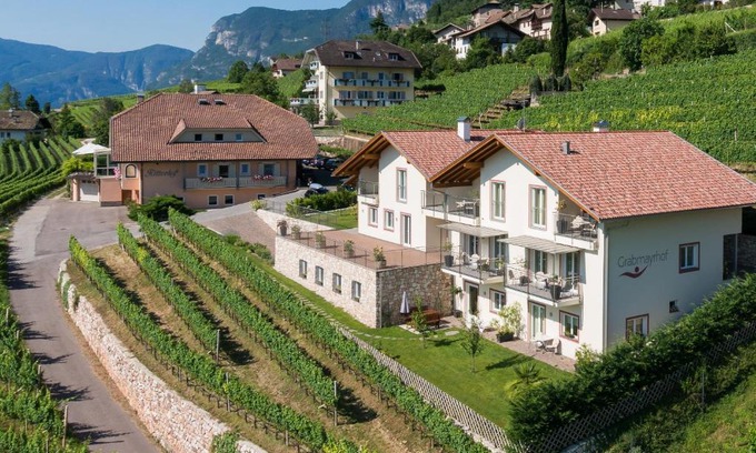Termeno Sulla Strada del Vino House | Experience Grabmayrhof: Pet-Friendly Oceanfront Escape