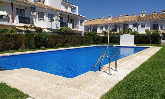 Islantilla House | Cozy Corner Townhouse Steps from the Beach in La Antilla
