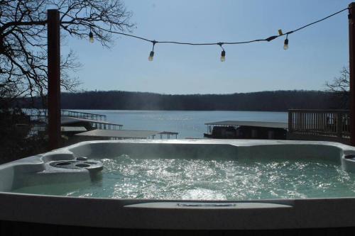 Osage Beach Villa | Relaxing Grand Glaize Getaway with Hot Tub and Firepit