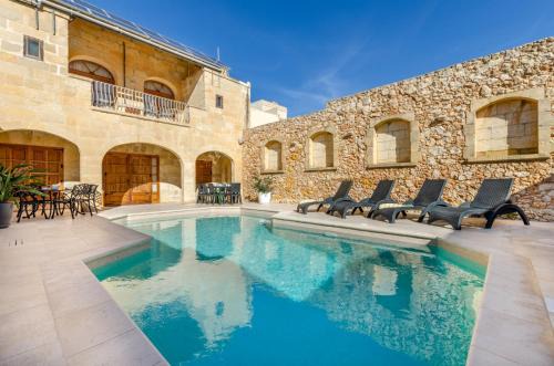 Sannat Villa | Rustic Gozo Farmhouse Escape with Pool and Oceanfront Views