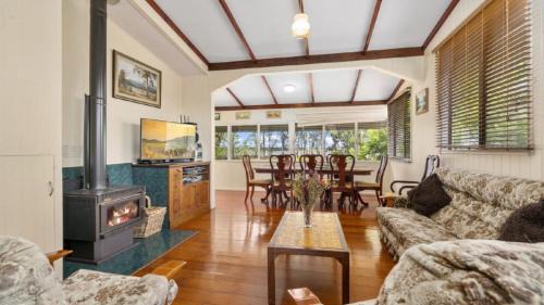 Bellara House | Inviting Grandad's Beach House: Pet & Child Friendly Retreat