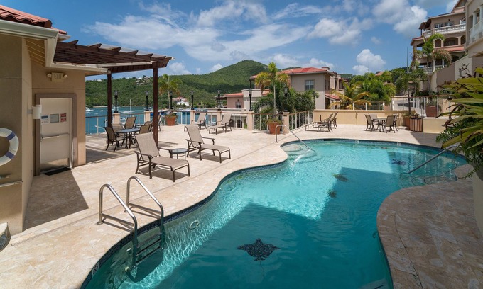 Estate Enighed Condo | Summer Special at Grande Bay: Renovated with Ocean View!