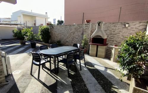 Lizzano Apartment | Charming Grande Bilocale with Garden & Family-Friendly Amenities