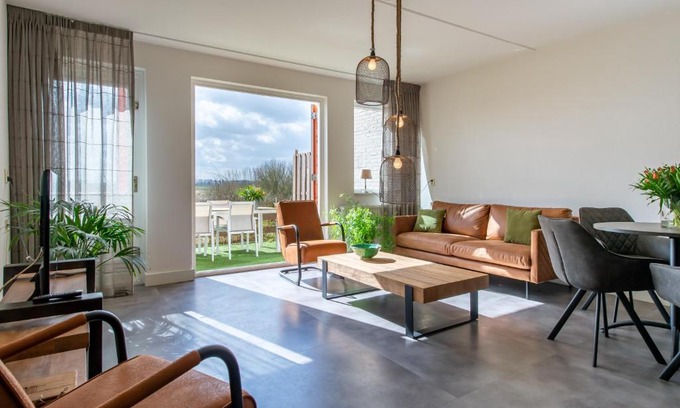 Hoofdplaat House | Cozy Grasse 140 at Kustpark Village Scaldia with Ocean Views