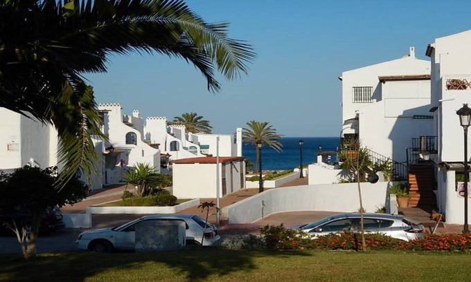 Castillo de Sabinillas Apartment | Convenient Apartment Steps from the Beach with Ocean Views