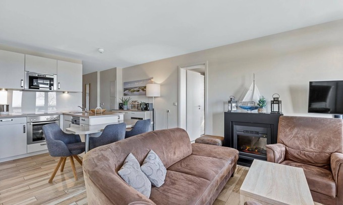 Wremen Apartment | Inviting Beachfront Apartment with Sauna & Balcony - Resort Deichgraf