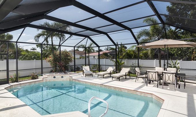 Naples Park House | Unforgettable Pool Oasis: Beach Access & Free Bikes Await