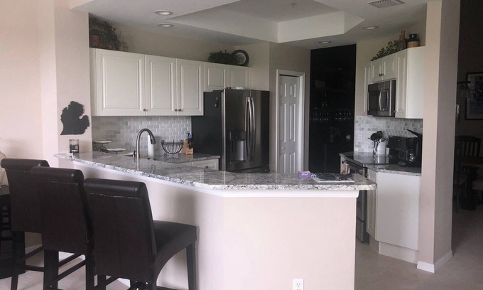 Whisper Trace Condo | Idyllic Lake View Retreat in Fiddler's Creek with Spa