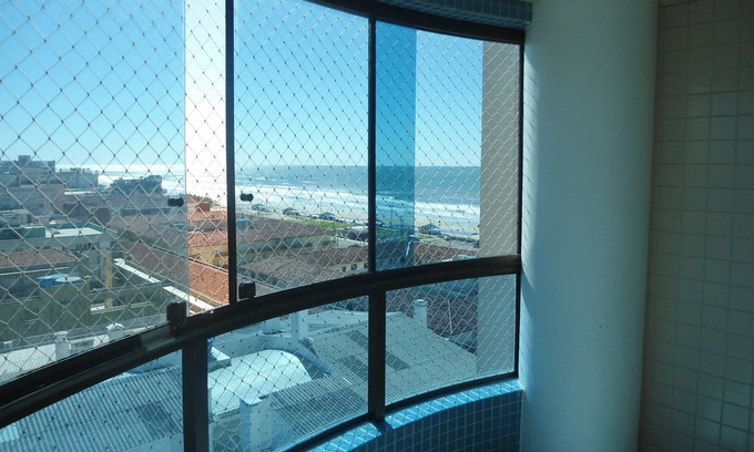 Capao da Canoa Apartment | Ideal Stay: Central Location with Ocean View & Great Amenities