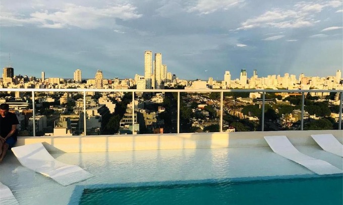 Chacarita Apartment | Modern Retreat with Pool and Rooftop Views - 4 Star Rated