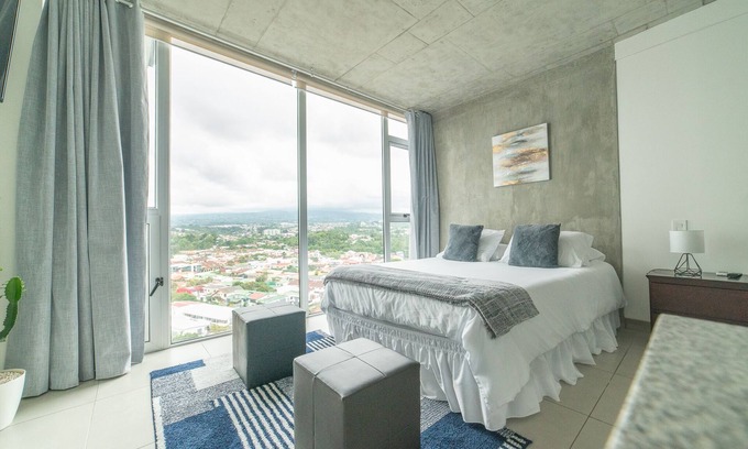 San Pedro Apartment | Stunning Views from 17th Floor with Pool & Spa Access