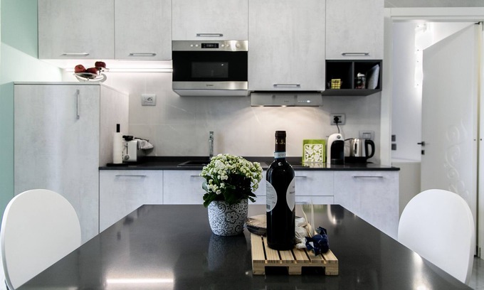 Nizza Monferrato Apartment | Modern Green Apartment at the Rotunda for Family Stays