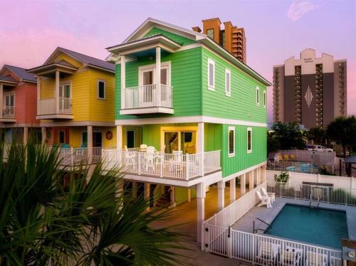 Gulf Shores House | Tropical Retreat: Poolside Bliss & Walk to Beach Awaits!