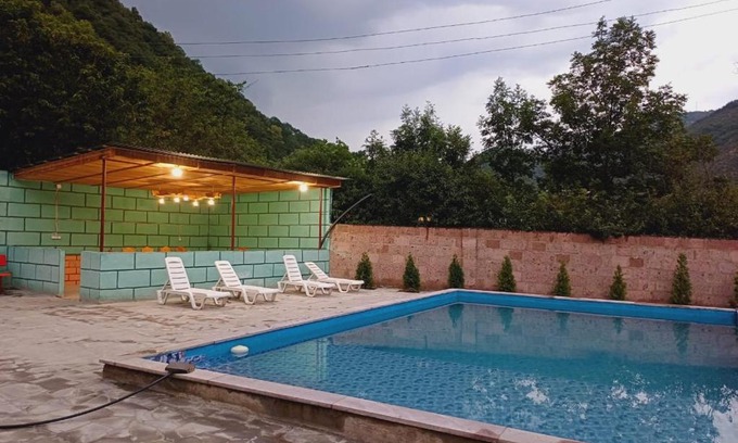 Kaputan House | Family-Friendly Green House with Pool Access for Your Stay