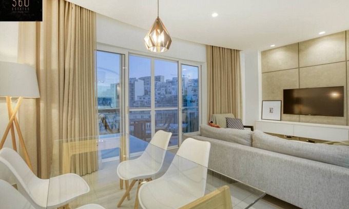 Il-Balluta Apartment | Green Oasis: Oceanfront Home with Spectacular Views