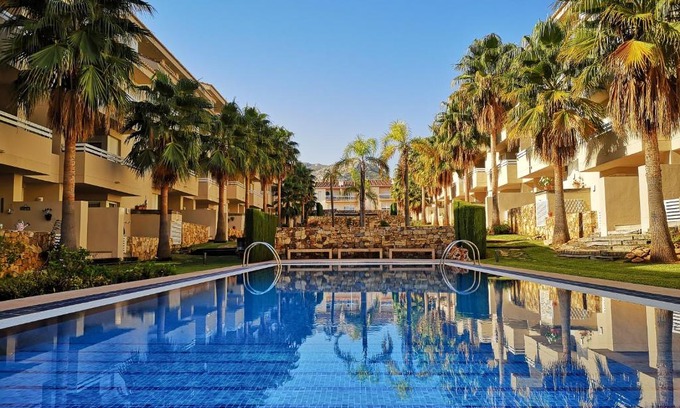 Pego Apartment | Relax in Green Paradise with Oceanfront Views & Pool Access