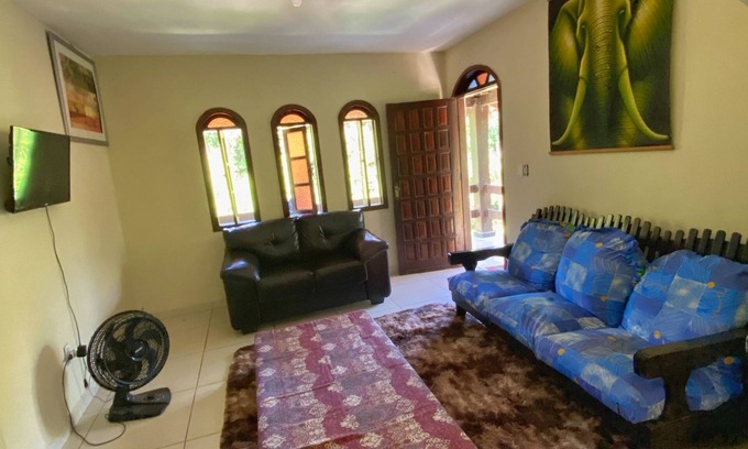 Porto Novo Apartment | Discover Greenhouse: Steps from Itauna Beach and Surfing