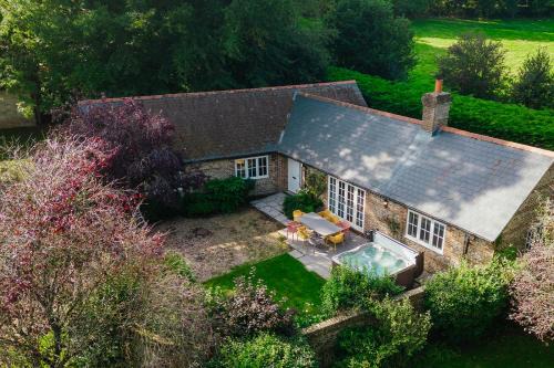 Dorchester House | Relax at Greenwood Grange: 4-Star Retreat with Pool & Hot Tub