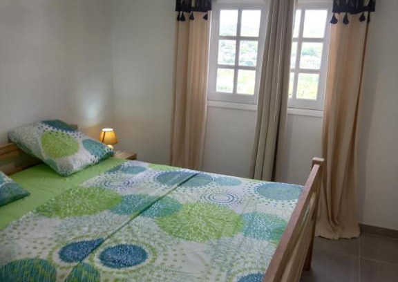 Trois-Ilets Apartment | Oceanfront Grenadine: A 4-Star Family Retreat with Views