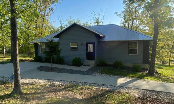 Lake Ozark Cabin | Spacious Grey Cabin for 16 with Family-Friendly Amenities
