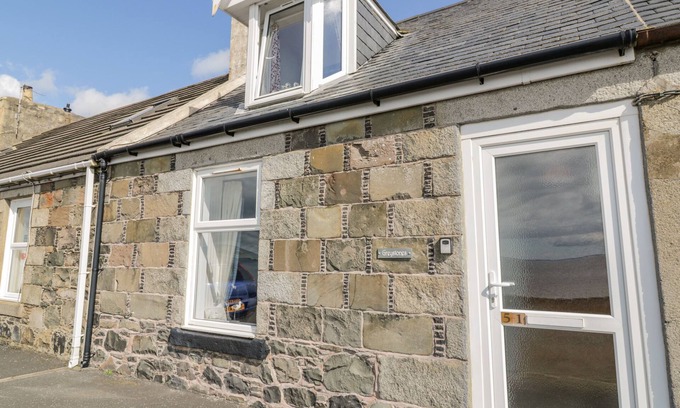 Port William House | Charming Greystones Cottage with Ocean Views in Port William