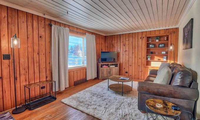 Newberry House | Guest Rated: Griffin's Sleek Pine Hideaway with Kitchen