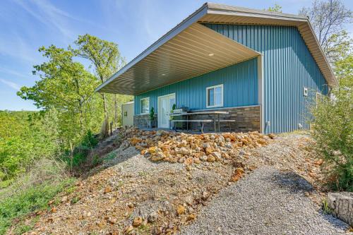 Camdenton House | Delightful Blue Cabin Ozarks Getaway with Fire Pit & Grill