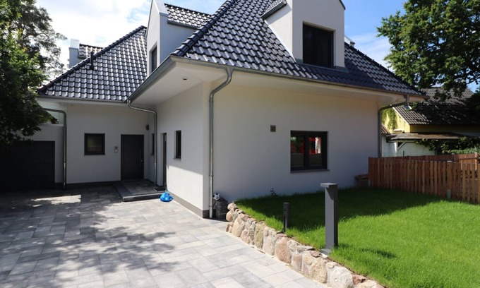 Neuhaus House | Seaside Retreat with Sauna & Top Guest Rating of 10/10