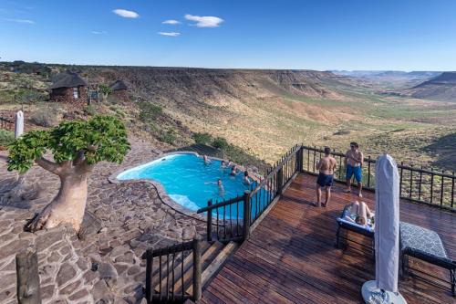 Palmwag Cabin | Grootberg Lodge: Scenic Oceanfront Retreat with Pool