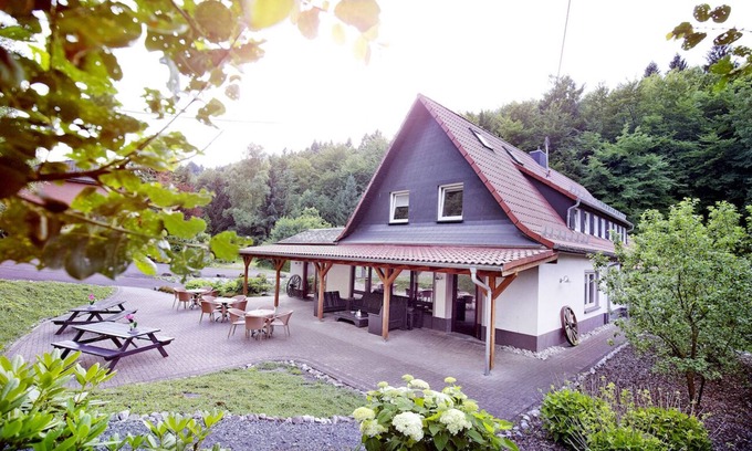 Schutzbach House | Ideal Family Retreat with Sauna, Hot Tub, and Private Theater
