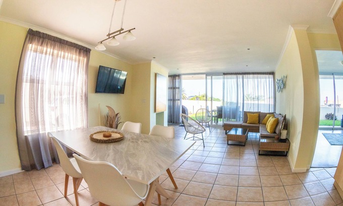 Jeffreys Bay Apartment | Ground floor apt. Central location. 350 metre walk to beach, restaurants & shops