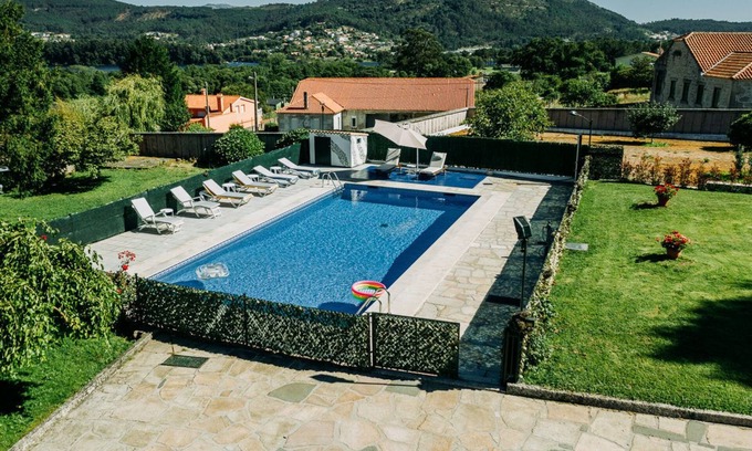 O Rosal Ski Chalet | Idyllic Oceanfront Retreat with Pool & Spa Amenities