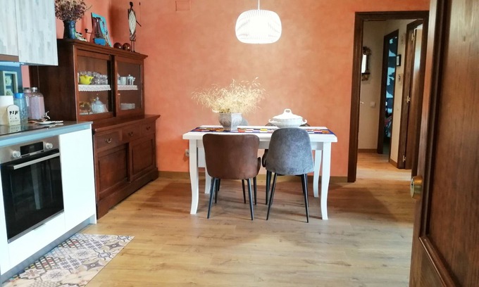 Taull Apartment | Ground Floor Puig Falcó 2: Garden Retreat with BBQ Access