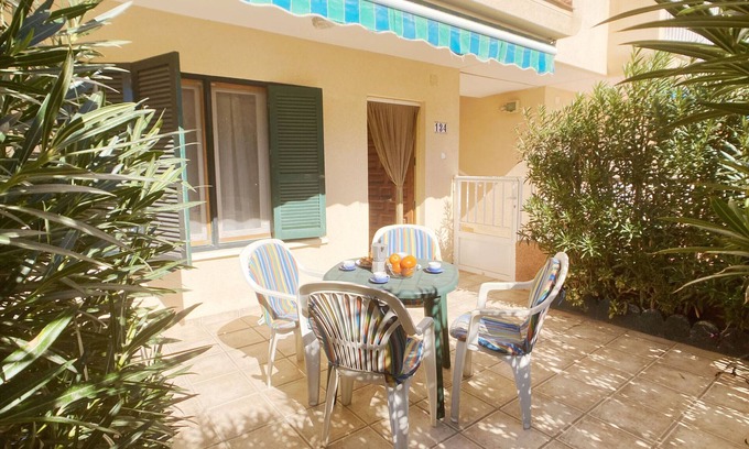 Diputacion de Rincon de San Gines Apartment | Groundfloor Retreat with Terrace in Plaza Bohemia