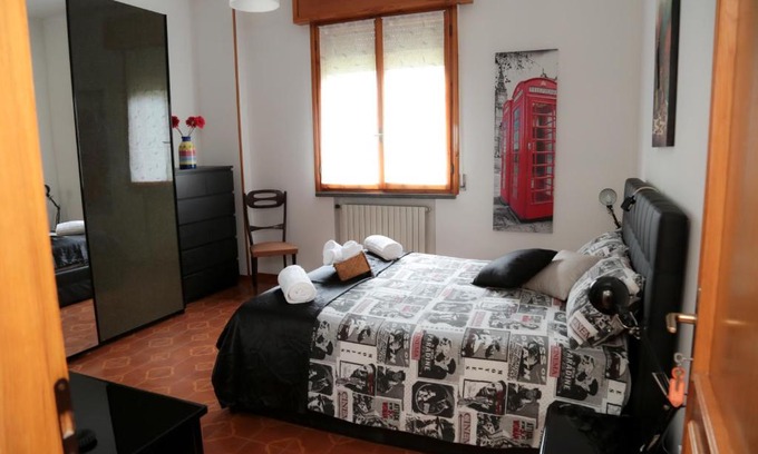Reggio nell'Emilia House | Cozy Guest House Via Emilia: Family-Friendly & Convenient