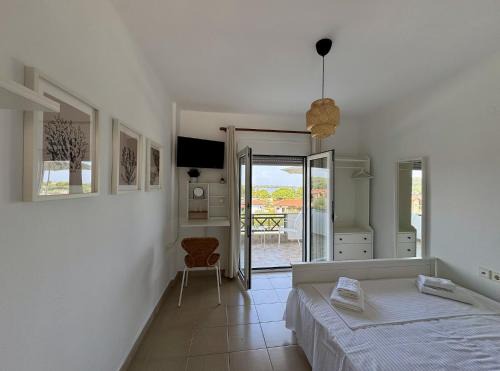 Vourvourou Apartment | Guest Room by House Dimitra