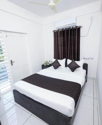 Kochi Hotel | Budget-Friendly Stay at Guest West Inn - Child Friendly