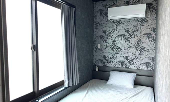 Amami Apartment | Cozy Guesthouse in Naze with Breakfast & Family-Friendly Vibe