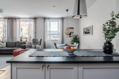 Pitea Apartment | Discover Guestly Homes: Family-Friendly 3BR Urban Retreat