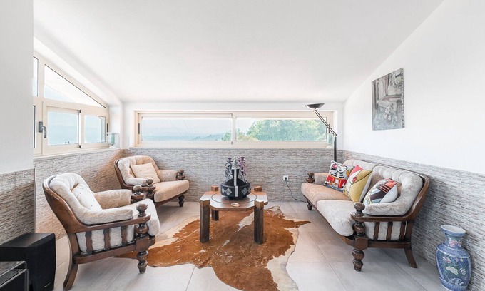 Mozelos House | Bright Lake View Retreat: GuestReady Crestuma Awaits